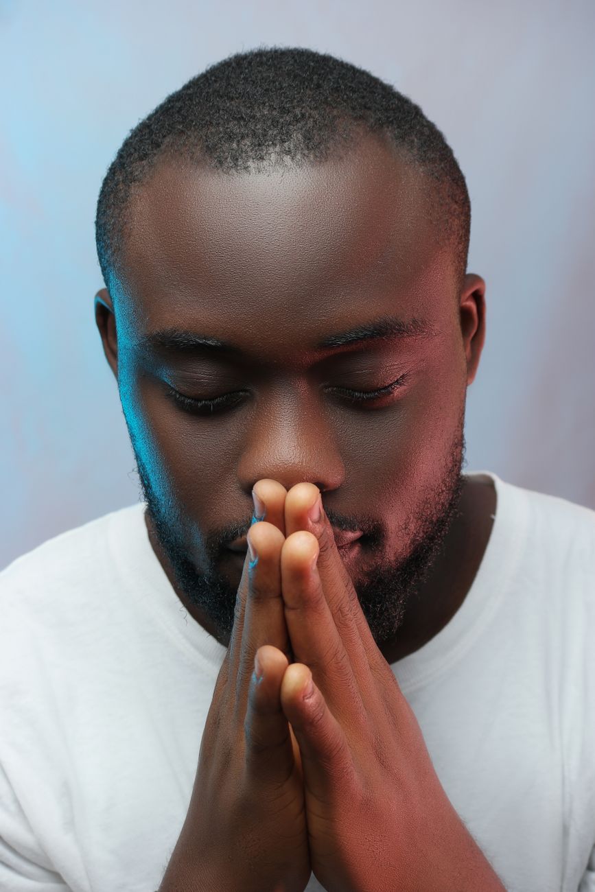 man focused on prayer