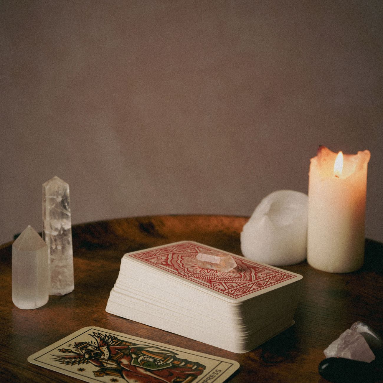 mystical tarot setup with crystals and candles